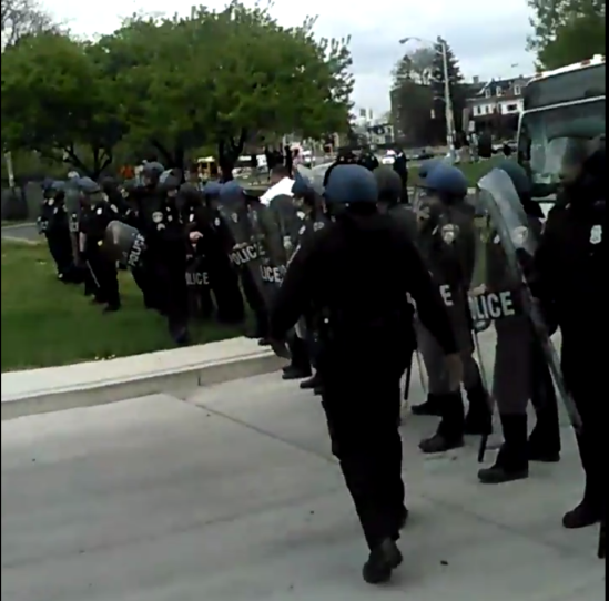 The initial police formation at Mondawmin separated students from the buses they would typically use to get home. (Scree capture from @baltospectator video.)